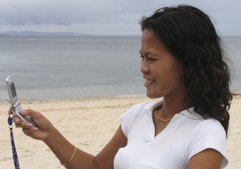 Asian woman on the phone, Philippines. Asian woman on the phone, Philippines