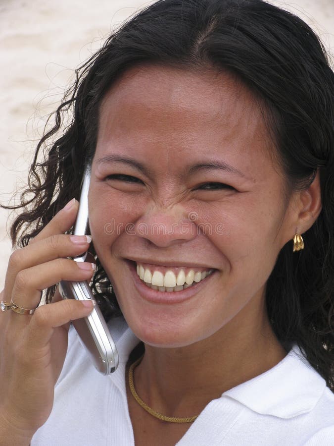 Asian woman on the phone, Philippines. Asian woman on the phone, Philippines