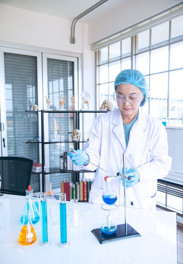 Asian woman scientist, researcher, technician, or student conducted research in laboratory