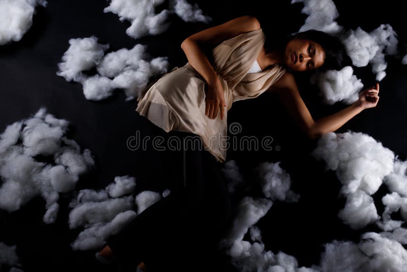 Asian Woman sleep on Scatter Fake Cloud at - Stock Photo [75595635] -  PIXTA