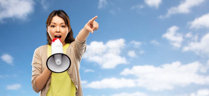 Asian woman speaking to megaphone