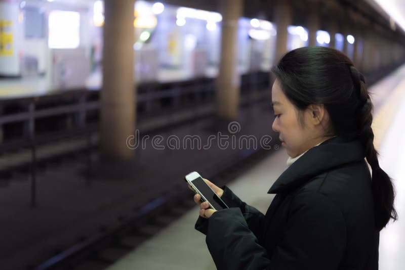 Asian woman in station stock photos Asian woman in station stock photos