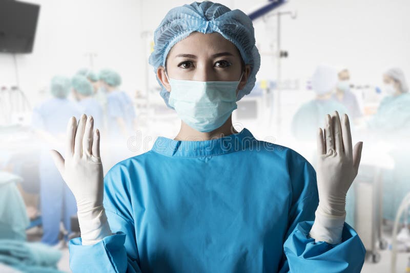 Asian woman surgeon in operation room