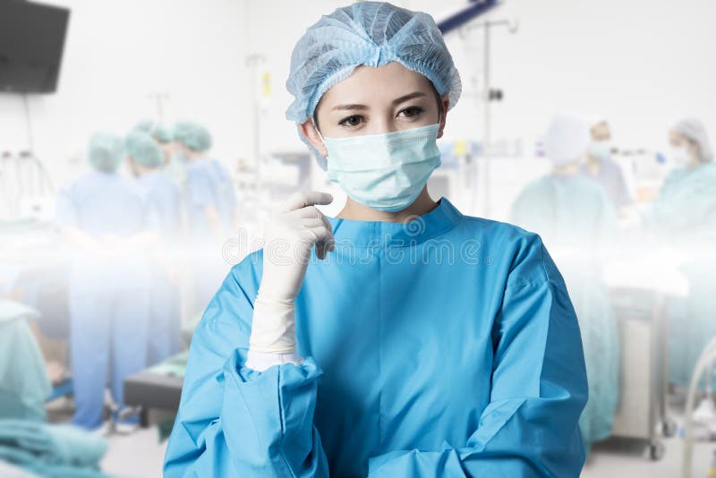 Asian woman surgeon in operation room