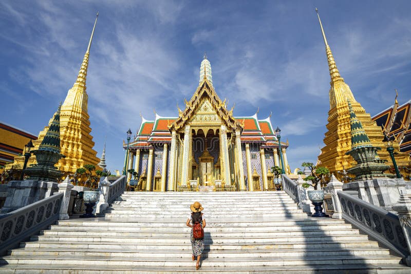 Asian woman traveller take a photo and travel in Bangkok grand palace and wat phra kaew in Bangkok city royalty free stock images Asian woman traveller take a photo and travel in Bangkok grand palace and wat phra kaew in Bangkok city royalty free stock images