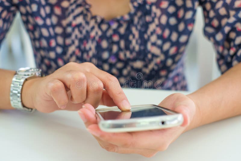 Asian woman using or smartphone royalty free stock photo