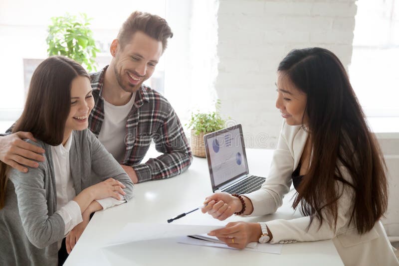 Asian realtor, insurance broker or financial advisor consulting stock photography Asian realtor, insurance broker or financial advisor consulting stock photography