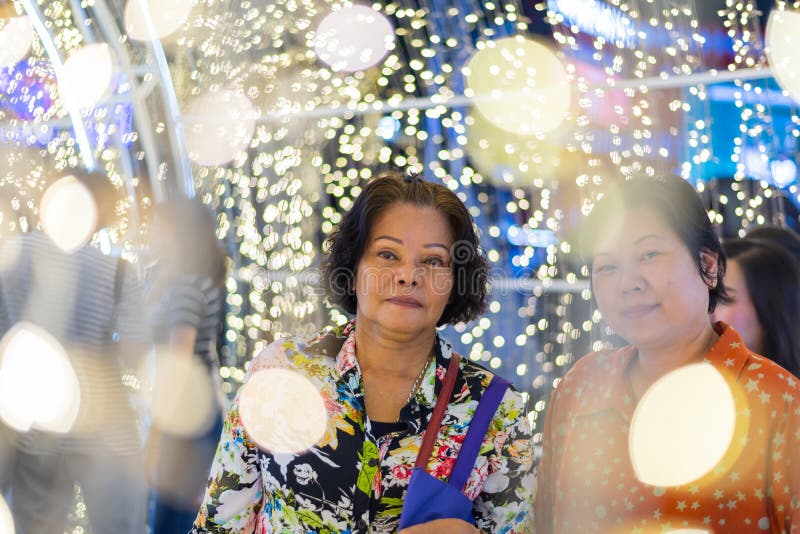 Asian women with bokeh of light for happy new year stock photos