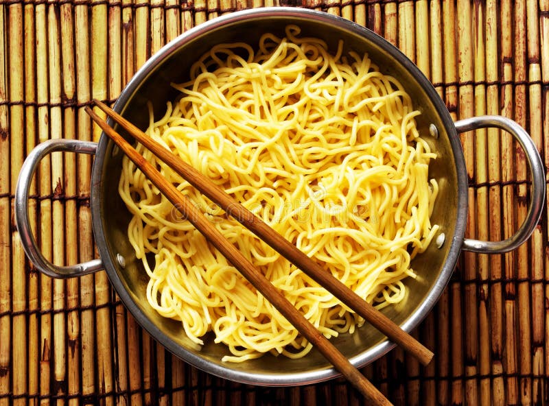 Asian yellow noodles stock photo. Image of chopsticks 17964160