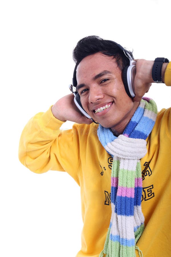 Asian young man listening music