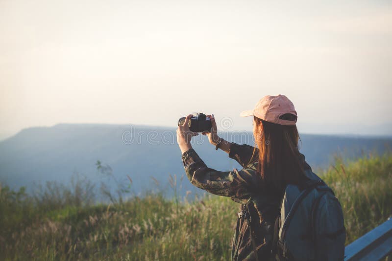asian young women people hiking with friends backpacks walking stock