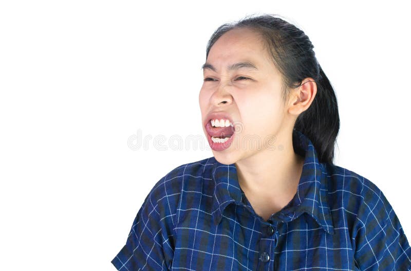 Asian young woman uses the tongue to clean the teeth due to food scraps attached to the teeth, Isolated on white background royalty free stock photos Asian young woman uses the tongue to clean the teeth due to food scraps attached to the teeth, Isolated on white background royalty free stock photos