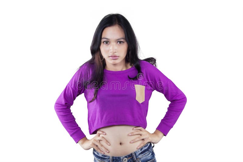 Asiatische Jugendliche schaut im Studio verärgert stockbild Asiatische Jugendliche schaut im Studio verärgert stockbild
