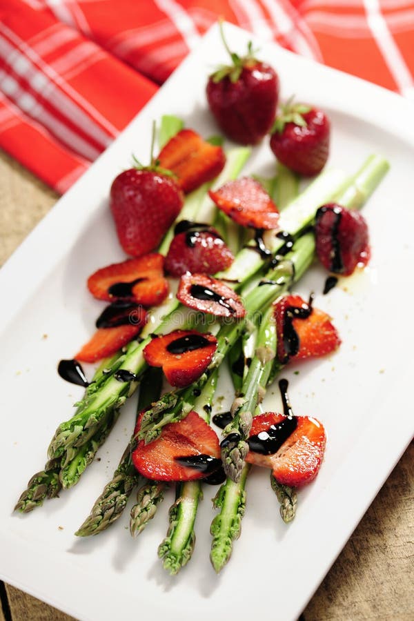 Food Asparagus and Strawberry Salad, Balsamico Marinated Stock Photo