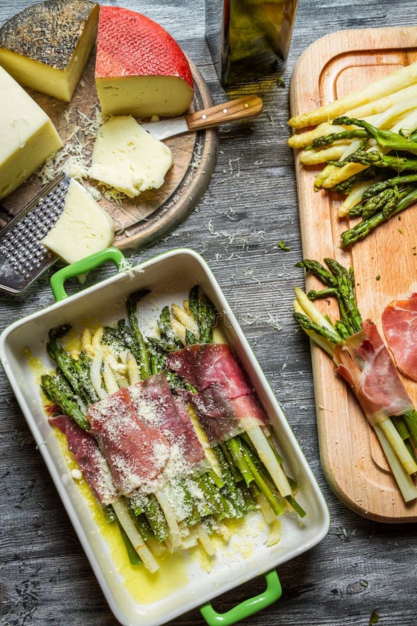 Asparagus Wrapped in Parma Ham with Cheese Stock Photo - Image of ...