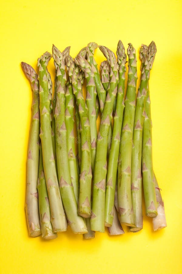 Asparagus on Yellow stock image. Image of ingredient, bunch 9208233