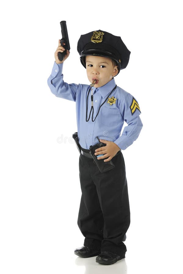 An adorable preschool policeman ready for action with his gun raised in his right hand, his whistle in his mouth and his left hand on his walkie talkie. On a white background. An adorable preschool policeman ready for action with his gun raised in his right hand, his whistle in his mouth and his left hand on his walkie talkie. On a white background.