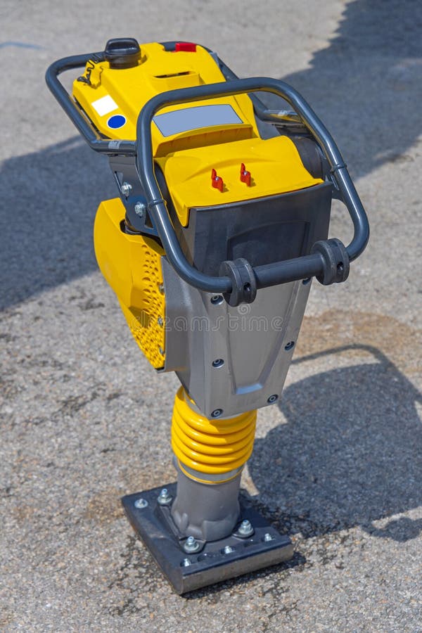 Asphalt Compaction Tamper stock image. Image of machine 267600063
