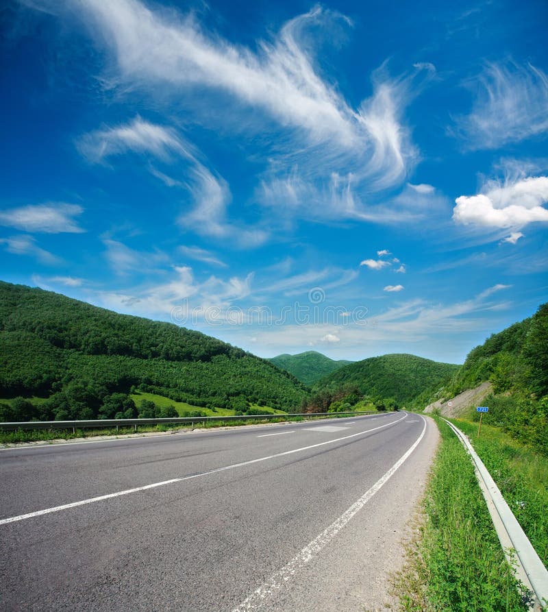 Empty Road Sign Towering Over Industrial Zone Scenic Green Hills And Road  Under Blue Sky Photo Background And Picture For Free Download - Pngtree