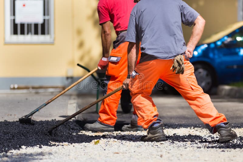 Asphalt Surfacing Manual Labor. Stock Photo - Image of machine, labor