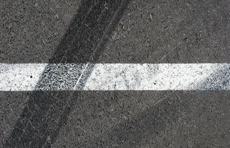 Asphalt Texture With White Line And Tire Marks Top View Stock Photo