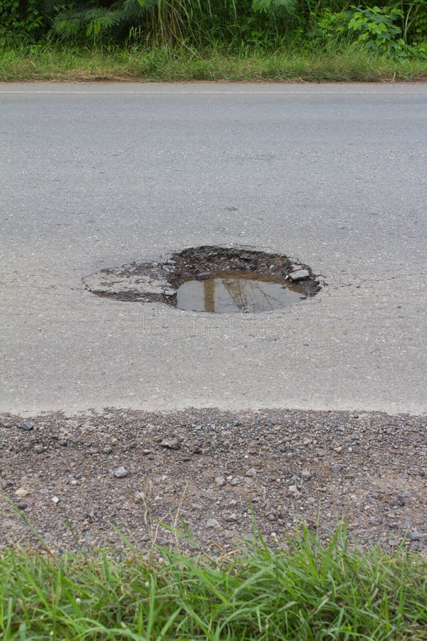 Asphalt was damaged and dangerous potholes.