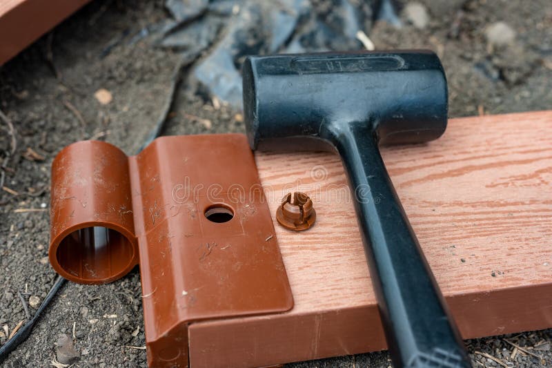 Assembling a Raised Bed Garden Panel with Plastic Connectors Using a