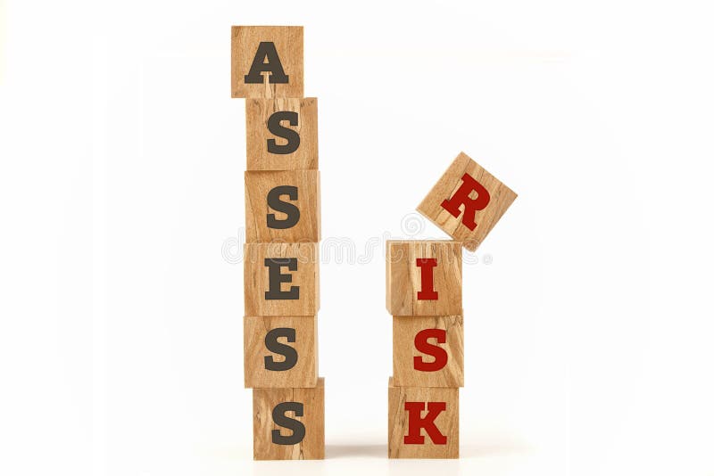 Assess Risk word written on cube shape. royalty free stock photography
