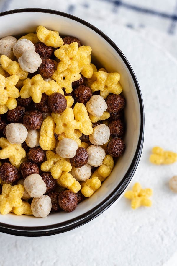 Assorted Breakfast Cereals Chocolate Balls and Honey Stars Stock Image