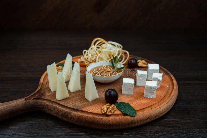 Assorted Caucasian Cheeses. Dish is Served with Honey and Nuts
