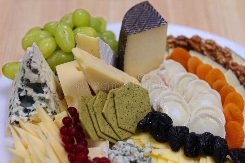 Assorted cheese platter stock photo. Image of charcuterie 144777524