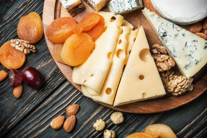Assorted Cheeses with Nuts and Dried Fruits Stock Photo Image of