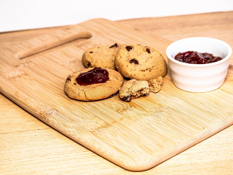 Assorted cookies with raspberry jam thumbprints royalty free stock photography