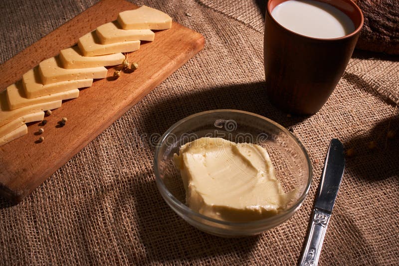 Assorted Dairy Products Milk, Cheese, Eggs. Rustic Still Life on Table