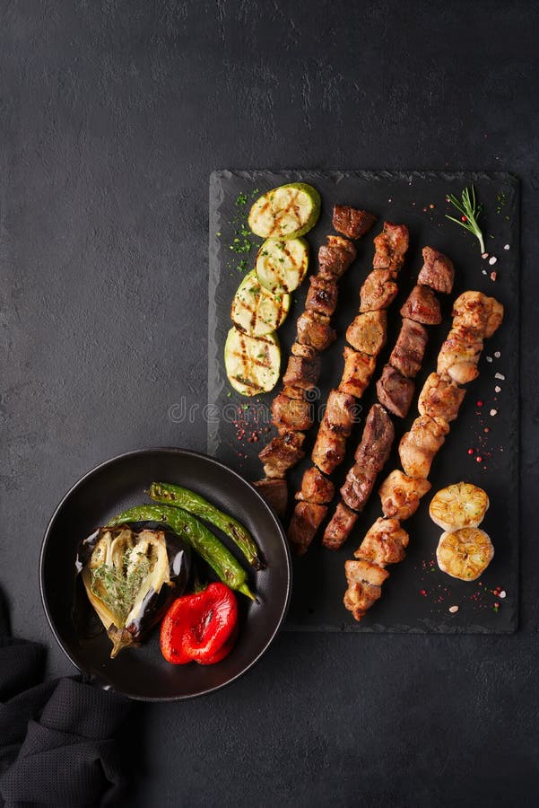 Assorted Different Kebabs on a Black Stone Plate Stock Photo Image of