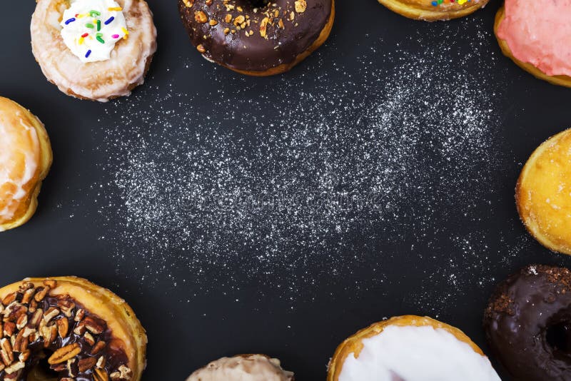 Assorted Donuts on Black Background Stock Image Image of overhead