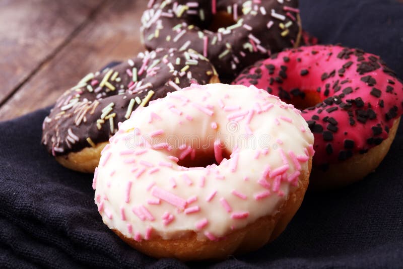 Assorted Donuts with Chocolate Frosted, Pink Glazed and Sprinkle Stock Image Image of fresh