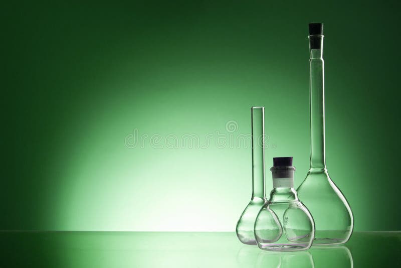 Assorted Empty Laboratory Glassware, Testtubes. Green Tone Medical