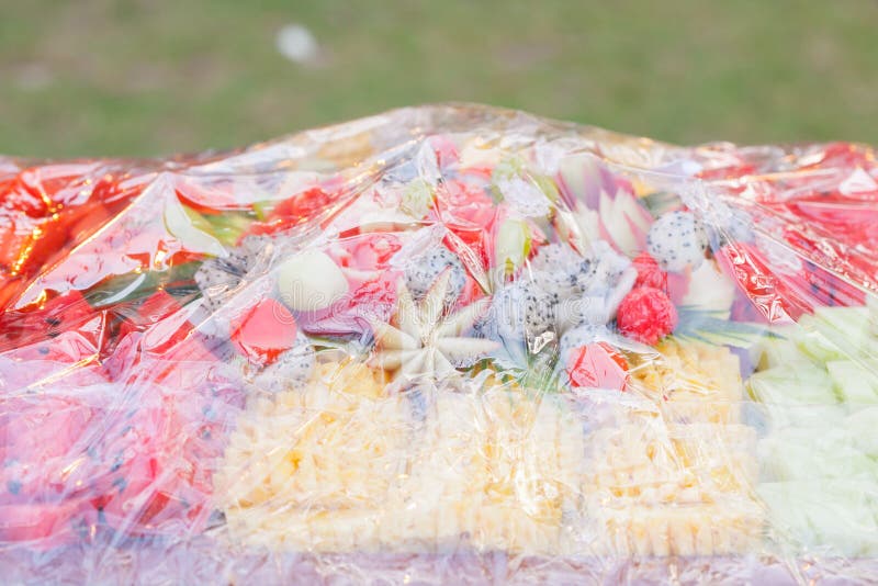 Assorted Fruits, Wrapped in Plastic Wrap for Buffet Line in Wed Stock Photo Image of white