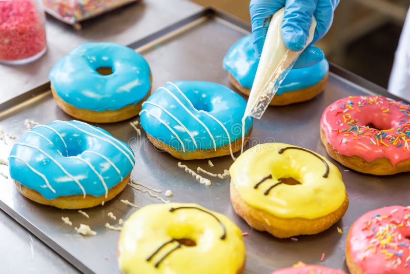 Assorted Glazed Doughnuts in Different Colors Stock Image - Image of ...