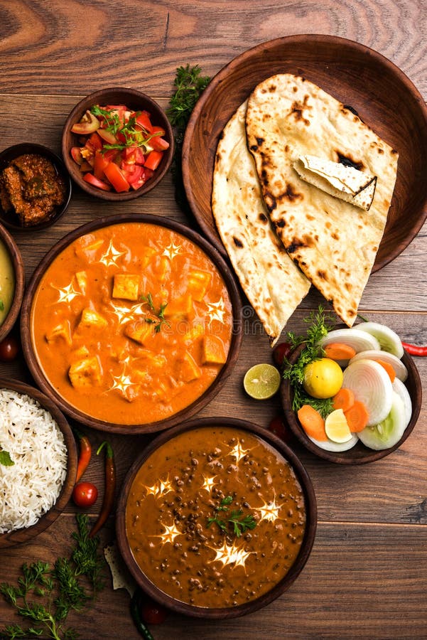 Indian Lunch or Dinner Items Like Dal, Paneer Butter Masala, Roti, Rice
