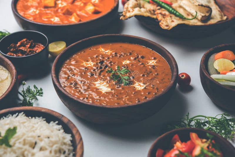 Indian Lunch Or Dinner Items Like Dal, Paneer Butter Masala, Roti, Rice