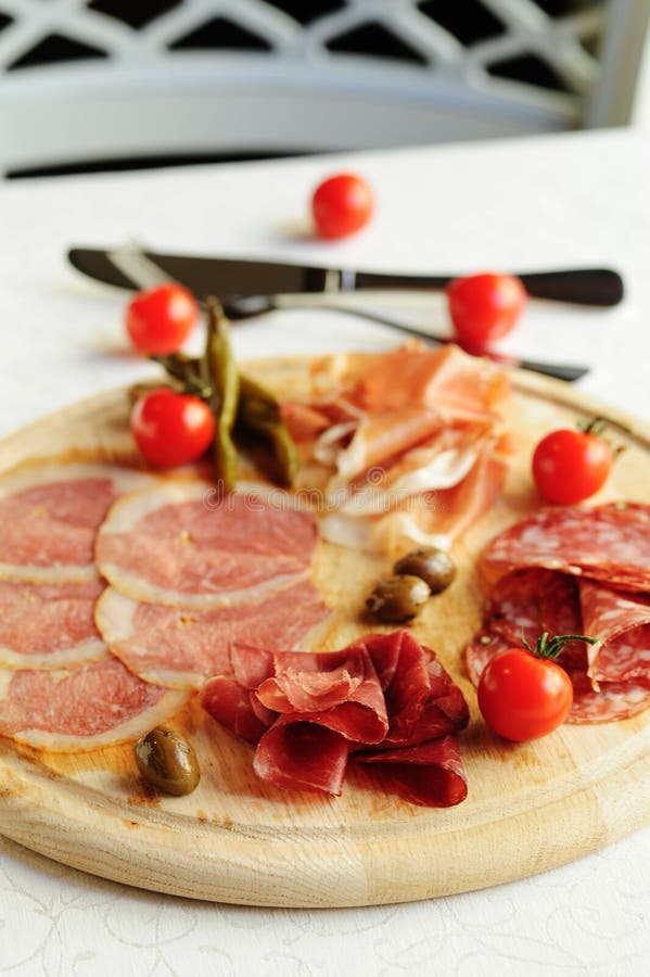 Assorted Italian Antipasti Deli Meats Fresh Cheese And Olives Stock