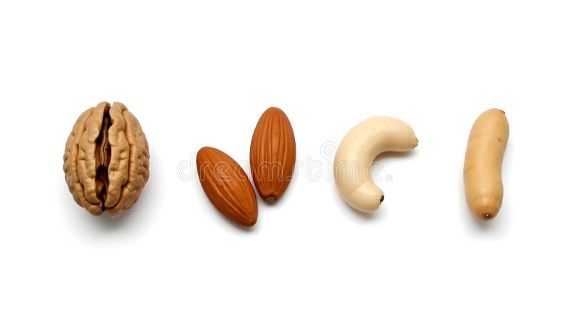 Assorted nuts arranged horizontally on white background stock illustration