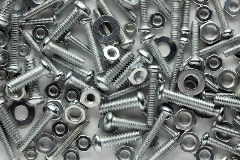 Assorted nuts and bolts background royalty free stock photo Assorted nuts and bolts background royalty free stock photo