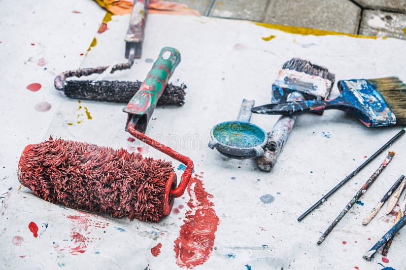 Assorted Paint Tools for Mural Creation stock images