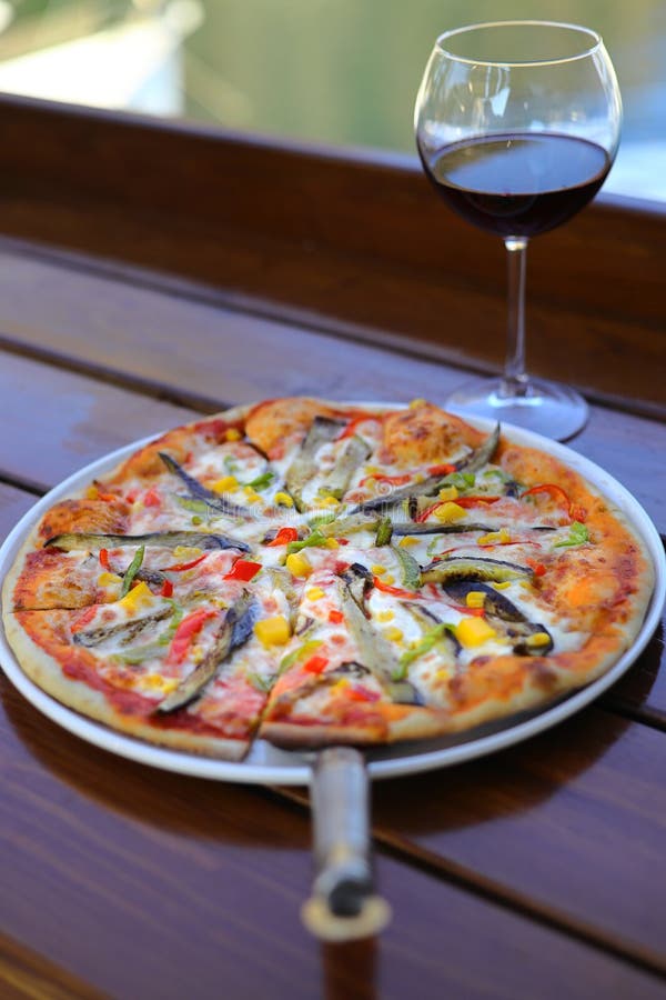 Assorted Pizza with Different Fillings Salami, Tomatoes, Mushrooms