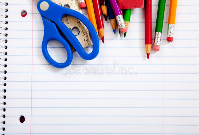 Assorted school supplies with notebooks