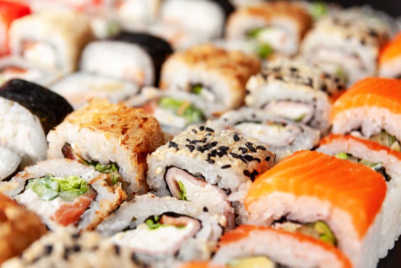 Assorted sushi rolls on black background stock photography Assorted sushi rolls on black background stock photography