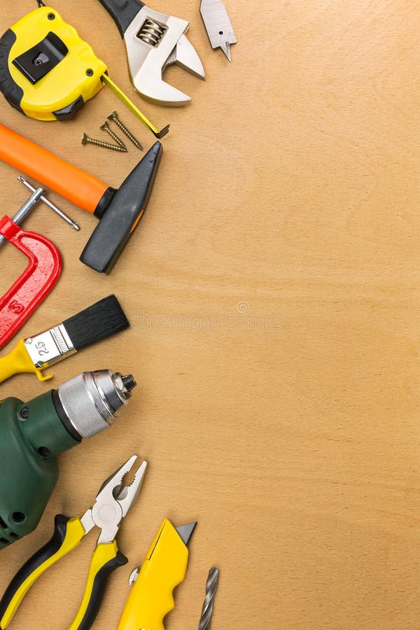 Assorted Construction Tools On Rustic Wooden Background. Stock Image